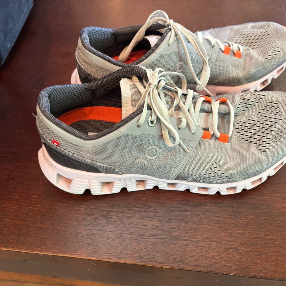 On Running Gray and Orange Athletic Shoes with Cushioned Sole